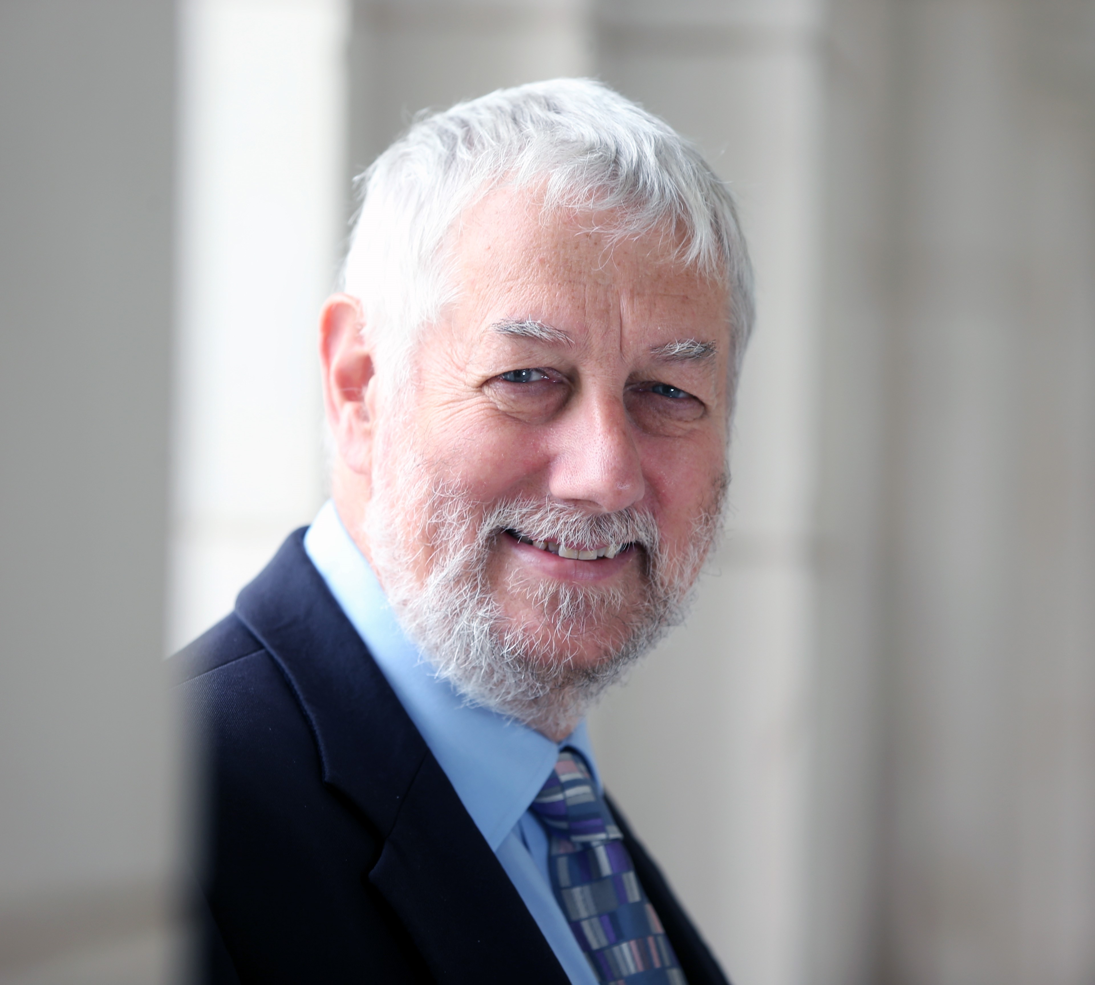 Headshot of Professor Graham John Hutchings CBE FREng FRS