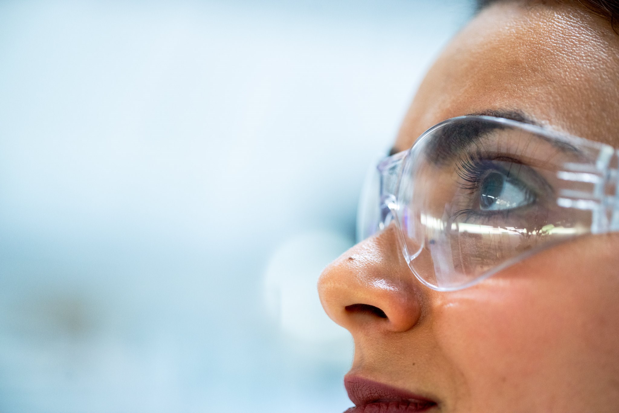 woman chemical engineer with protective eyewear