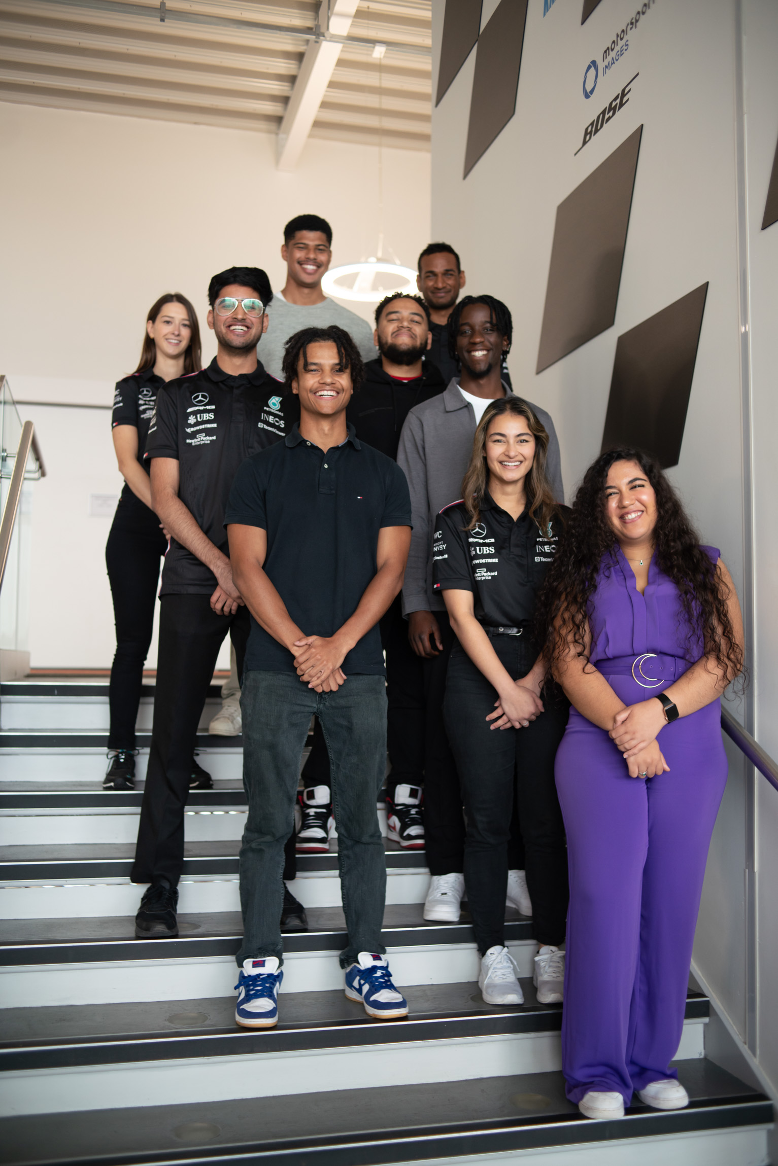 The five new scholarship students alongside engineers from Mercedes-AMG PETRONAS F1 Team.