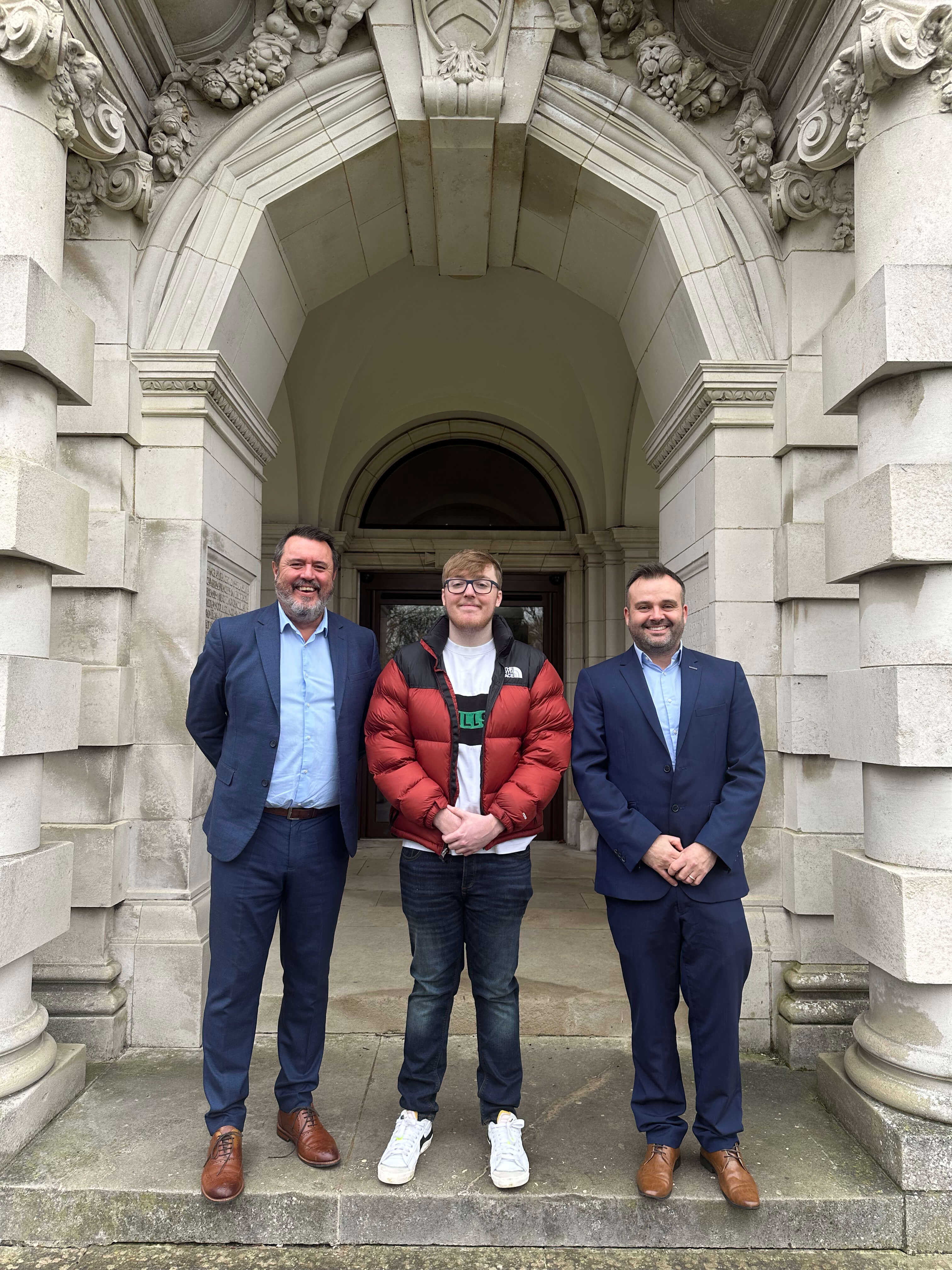 Elis Thomas (centre) first recipient of a Panasonic Trust higher education bursary, with Carl Pocknell, Chair of the Panasonic Trust (left) and Rob Blowers, Managing Director of Panasonic Manufacturing UK (right).
