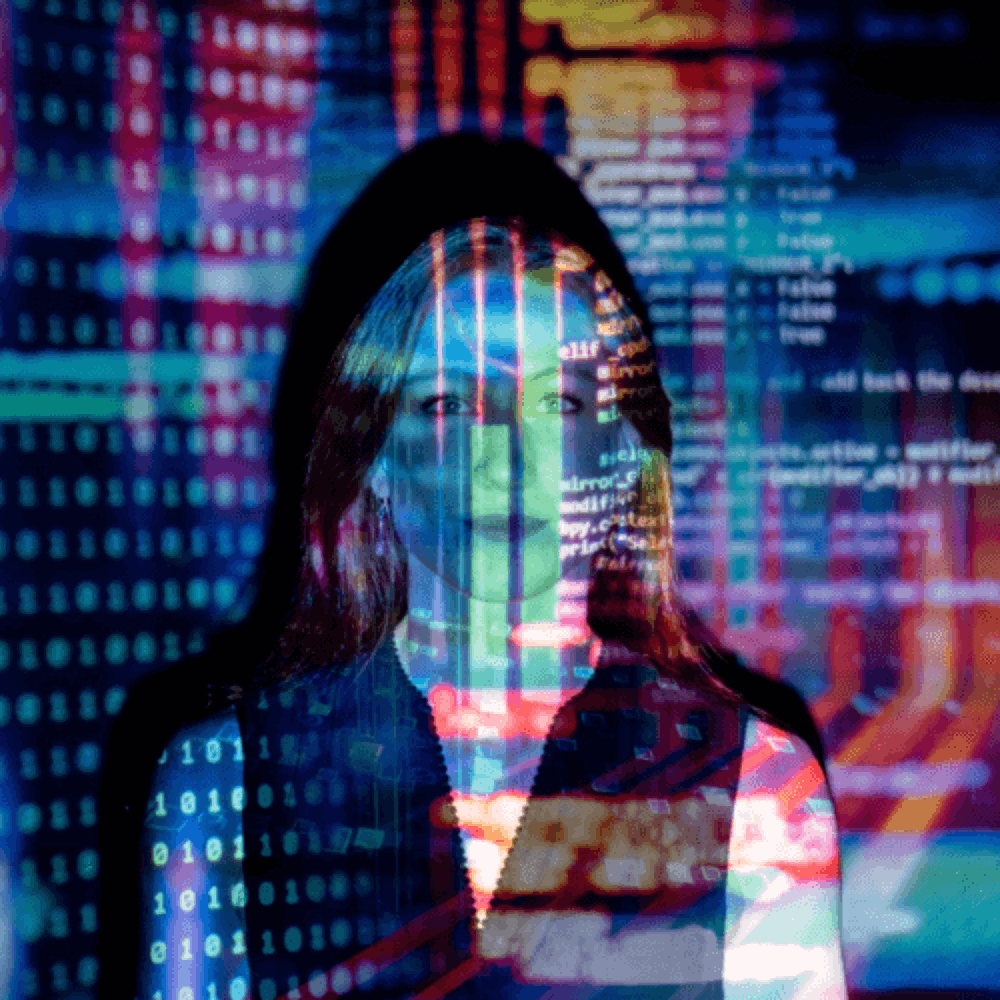 Code Projected On Woman's Face