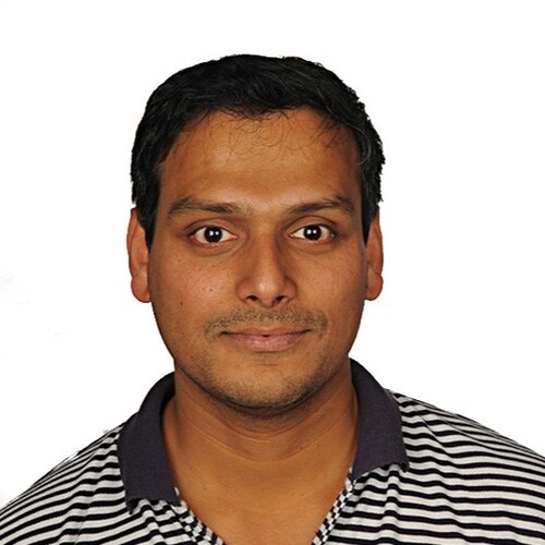 Headshot of Dr Roshan Naik.