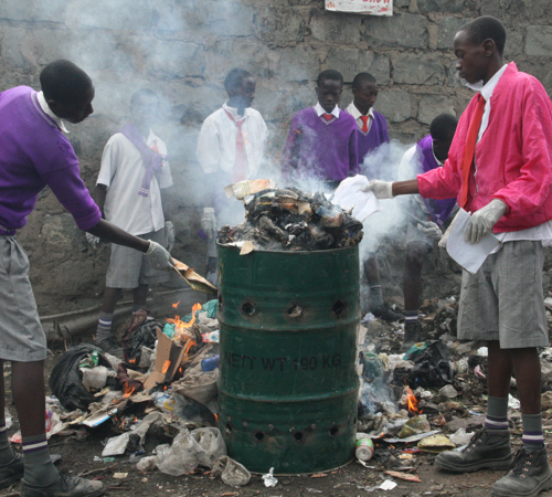 Wasteaid Students Burning Waste In Kwa Muhia Kenya 2011