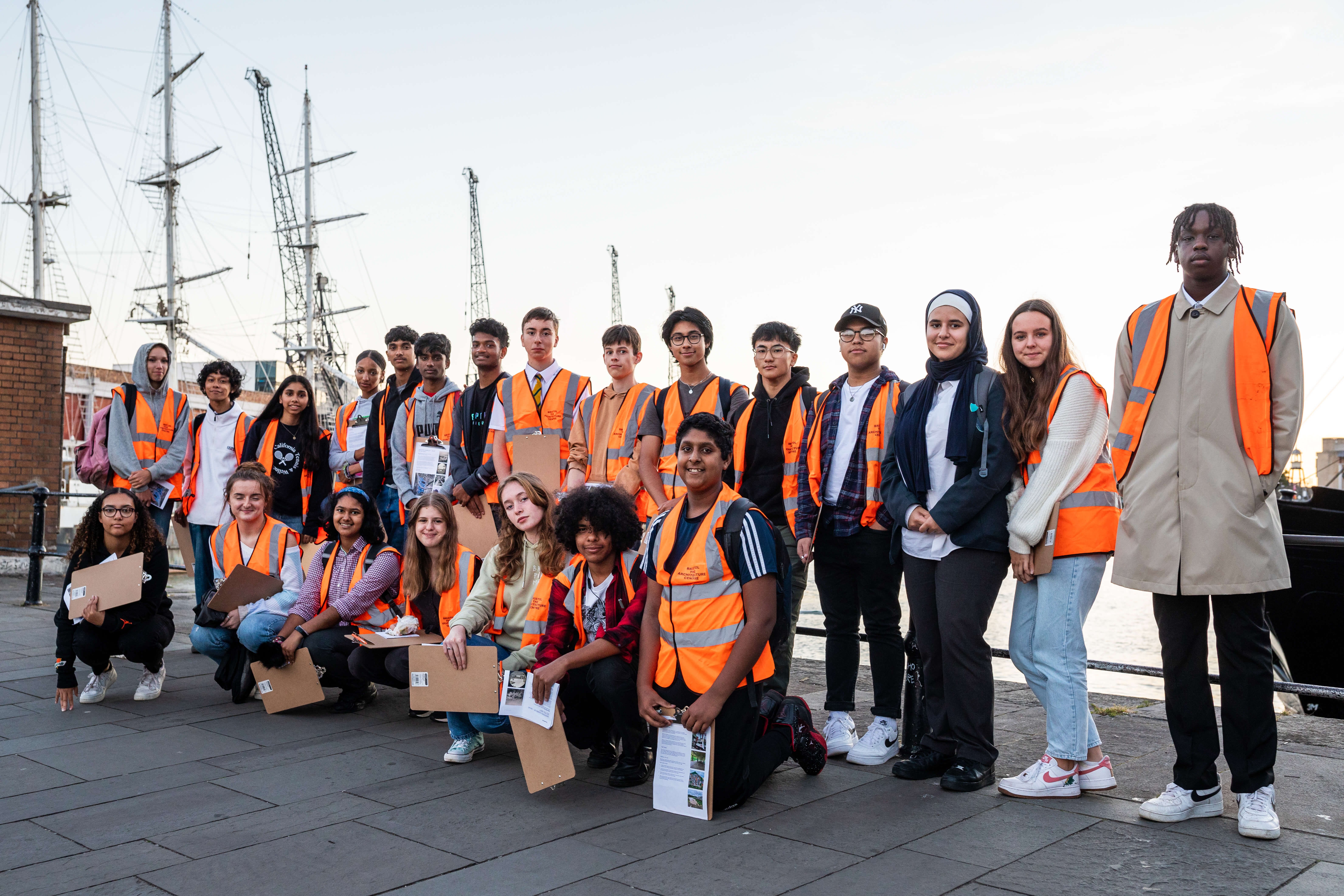 Group of secondary school students at the docks