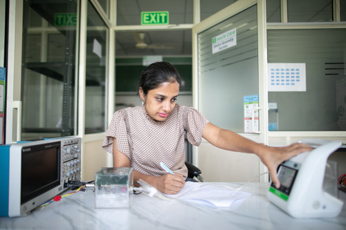 Photo of Shivani working with InoHeal.