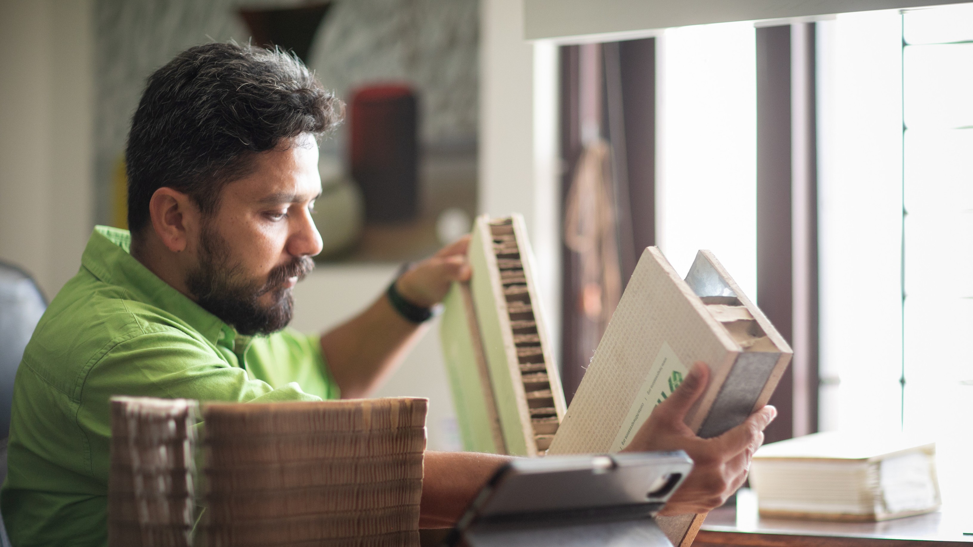 An image shows an innovator looking at their innovation.