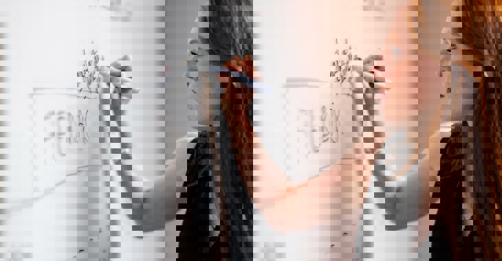 White Woman Working At Whiteboard Landscape